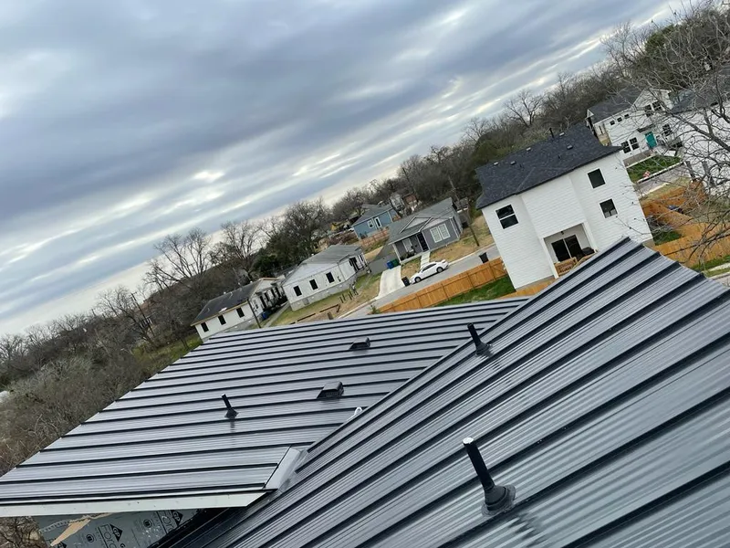 Standing seam metal roof panels with vents for Skylight Repair in Richfield
